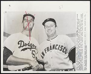 Set for Second Game--The winningest pitchers in the major leagues this season, Don Drysdale of the Los Angeles Dodgers and Jack Sanford of the San Francisco Giants, posed in a handshake before taking the mound in second game of the National League playoffs at Dodgers Stadium in Los Angeles today. Giants won the opener, 8-0. Drysdale tops major league pitchers with 25 wins; Sanford has 24.
