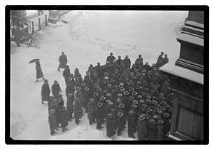 A group of people outside in the snow