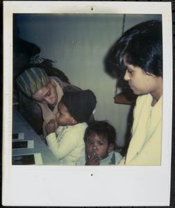 Two women with children