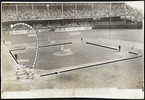 Two Runs and a Cardinal Victory -- Cardinal Third Baseman George "Whitey" Kurowski trots in home after slamming a home-run hit (dotted line) into the lower left field stands, scoring Walker Cooper and himself for the two runs which beat the Dodgers 2 to 1 in Ebbets Field here today. Cooper and Johnny Hopp wait to give Kurowski the glad hand. The victory brought the Cardinals into a tie with the Dodgers in the National League pennant race.