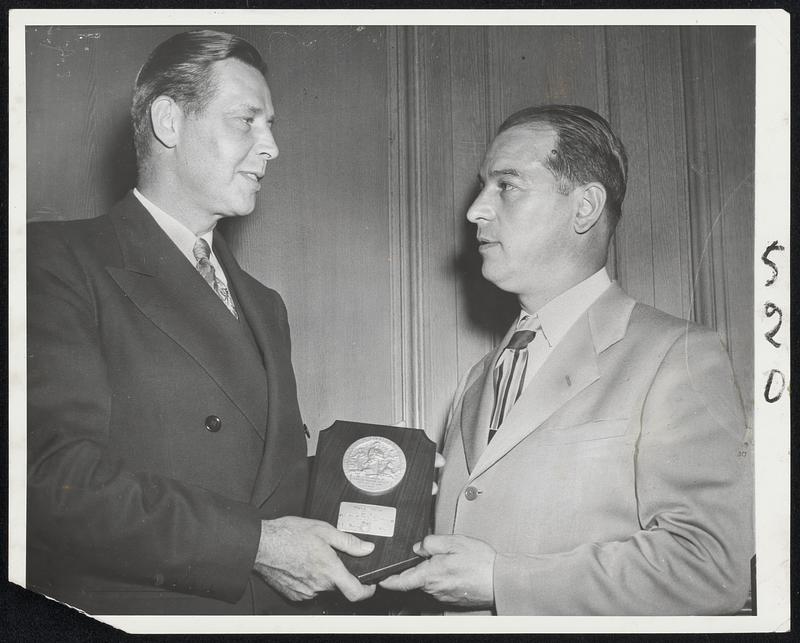 Secretary Tobin Gets Plaque – Secretary of Labor Maurice Tobin, left, receives the national Civic award of the Fraternal Order of Eagles by the group's vice president, John F. Kelley of Cambridge, at a ceremony in Washington. The plaque was for Tobin’s “courageous leadership in establishing the rights of labor and promoting better relations between management and labor.”