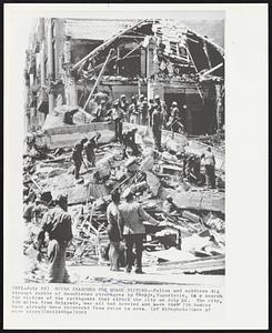 Ruins Search For Quake Victims -- Police and soldiers dig through rubble of demolished structures in Skopje, Yugoslavia, in a search for victims of the earthquake that struck in the city on July 26. The city, 200 miles from Belgrade, was all but leveled and more than 700 bodies have already been recovered from ruins in area.