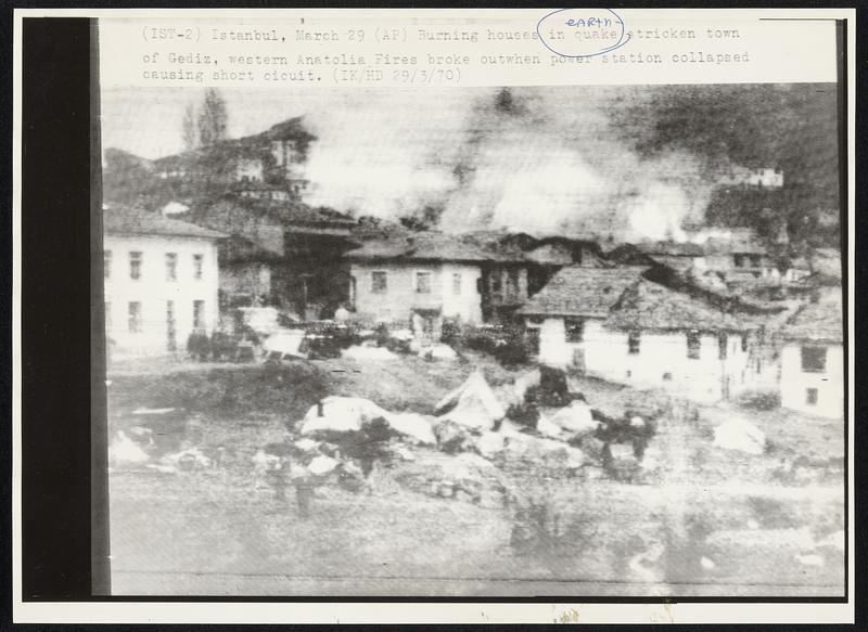 Burning houses in quake stricken town of Gediz, western Anatolia Fires broke outwhen power station collapsed causing short cicuit.