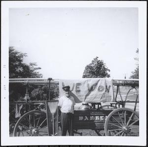 Harold B. Olsen with Warren hand tub after victory