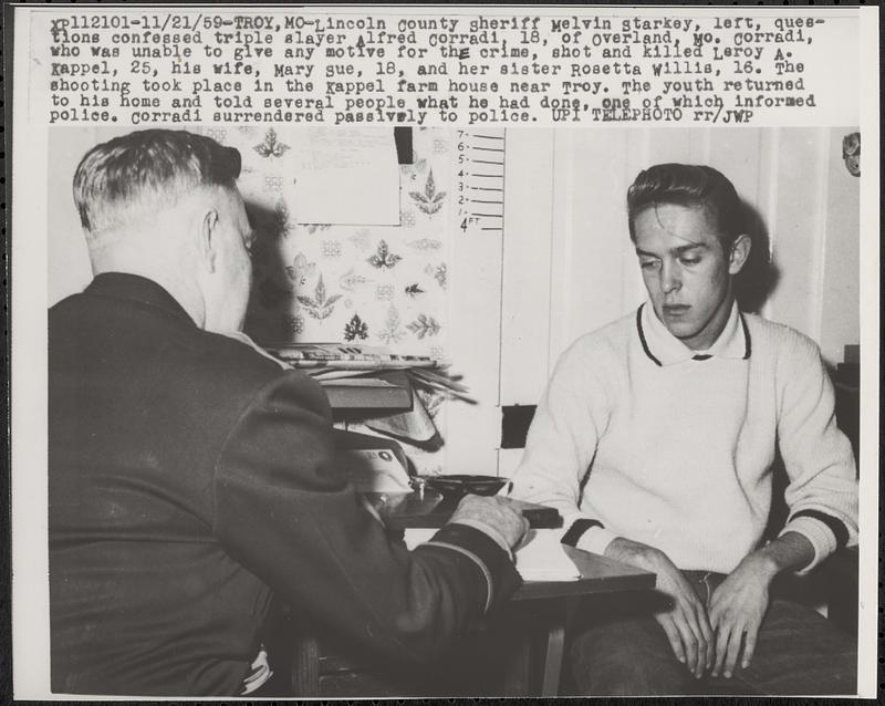 Lincoln County sheriff Melvin Starkey, left, questions confessed triple slayer Alfred Corradi, 18, of Overland, Mo.