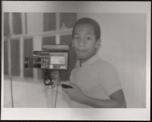 Boy with a video camera