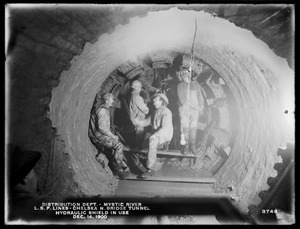 Distribution Department, Low Service Pipe Lines, Chelsea North Bridge Tunnel, tunnel heading, showing hydraulic shield in use, Mystic River; Charlestown; Chelsea, Mass., Dec. 14, 1900