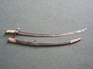 Cavalry saber, brass guard and hilt with oak