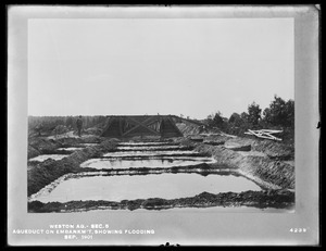 Weston Aqueduct, Section 5, aqueduct on embankment, showing flooding, Framingham, Mass., Sep. 1901