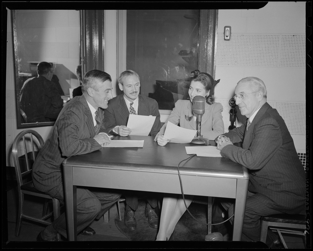 Governor Saltonstall, unidentified man, Evelyn Howe, and Postmaster Patrick J. Connelly in radio studio