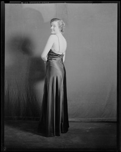 Portrait of a woman standing. Possibly Betty Welsh