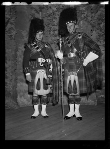 Two musicians from the Scottish Highlanders Pipe Band