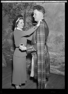 Woman and man from the Scottish Highlanders Pipe Band