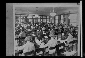 Do/More Chairs advertisement, room full of women working with adding machines