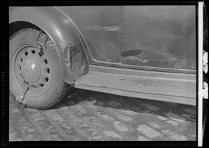 Volini accident, view of wheel and running board