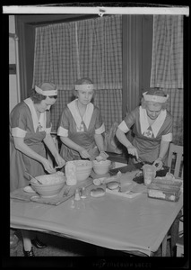 Red Cross workers preparing a meal