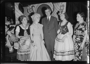 International Institute Costume Ball, four women in costume with Governor Saltonstall