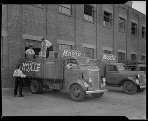 Men loading a Moxie truck