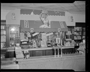 Soda fountain with Moxie signs