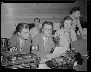 WEEI broadcasters at CBS microphone