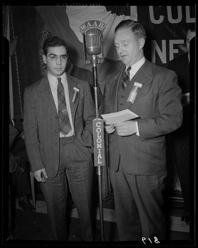 Unsung heroes with their coach at the WAAB Colonial Network microphone