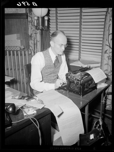 Cedric Foster at typewriter