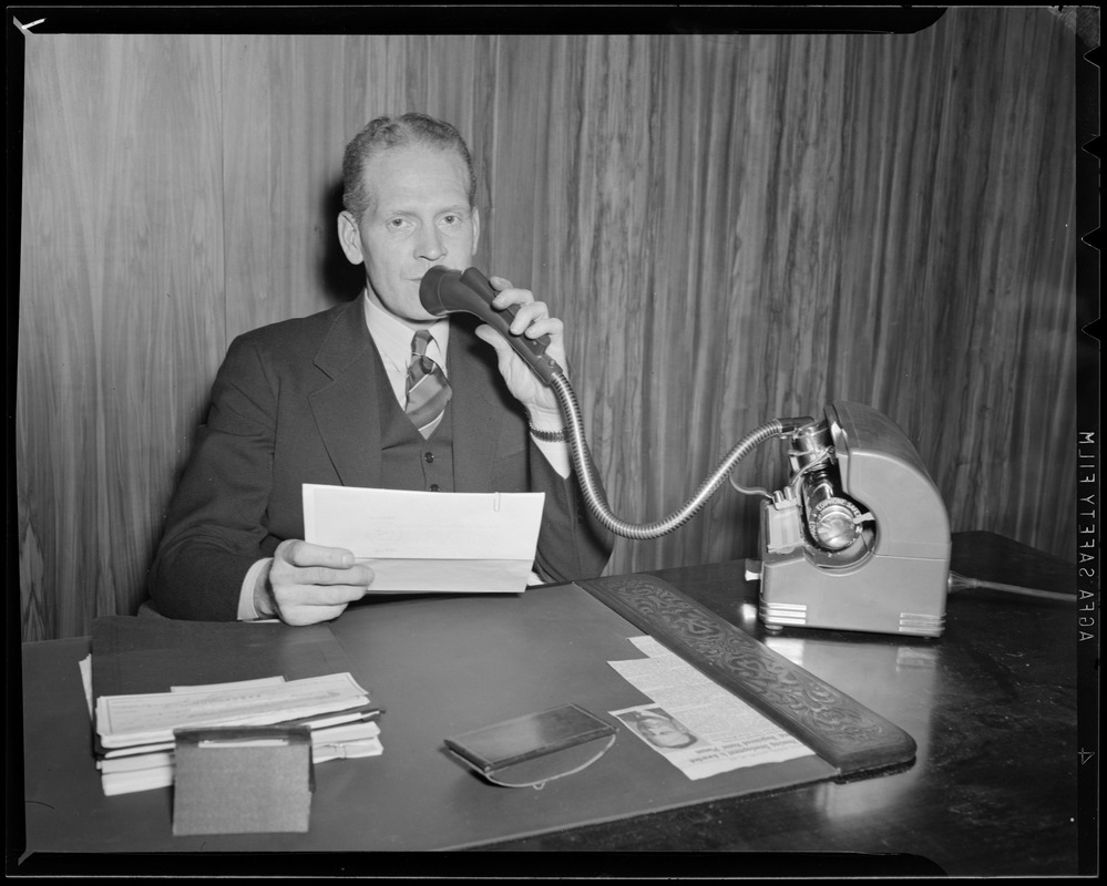 Broadcaster at desk