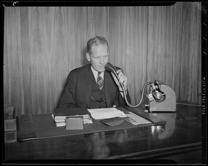 Broadcaster at desk