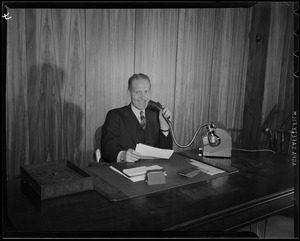 Broadcaster at desk