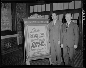 Ushers at Loew's Statestand with a sign promoting Quiz of Two Cities