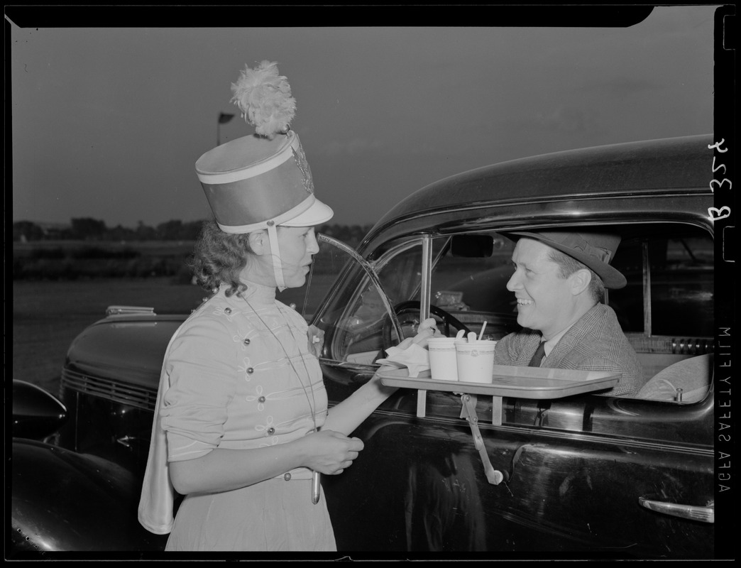 Carhop waitress delivering food to a car Digital Commonwealth