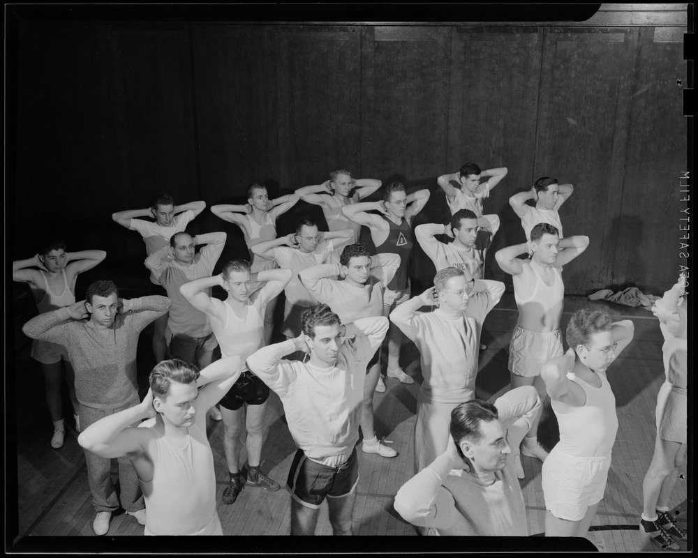 Group of men stretching