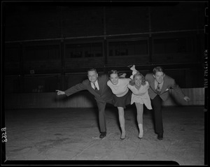Four members of the Skating Club of Boston ice skating