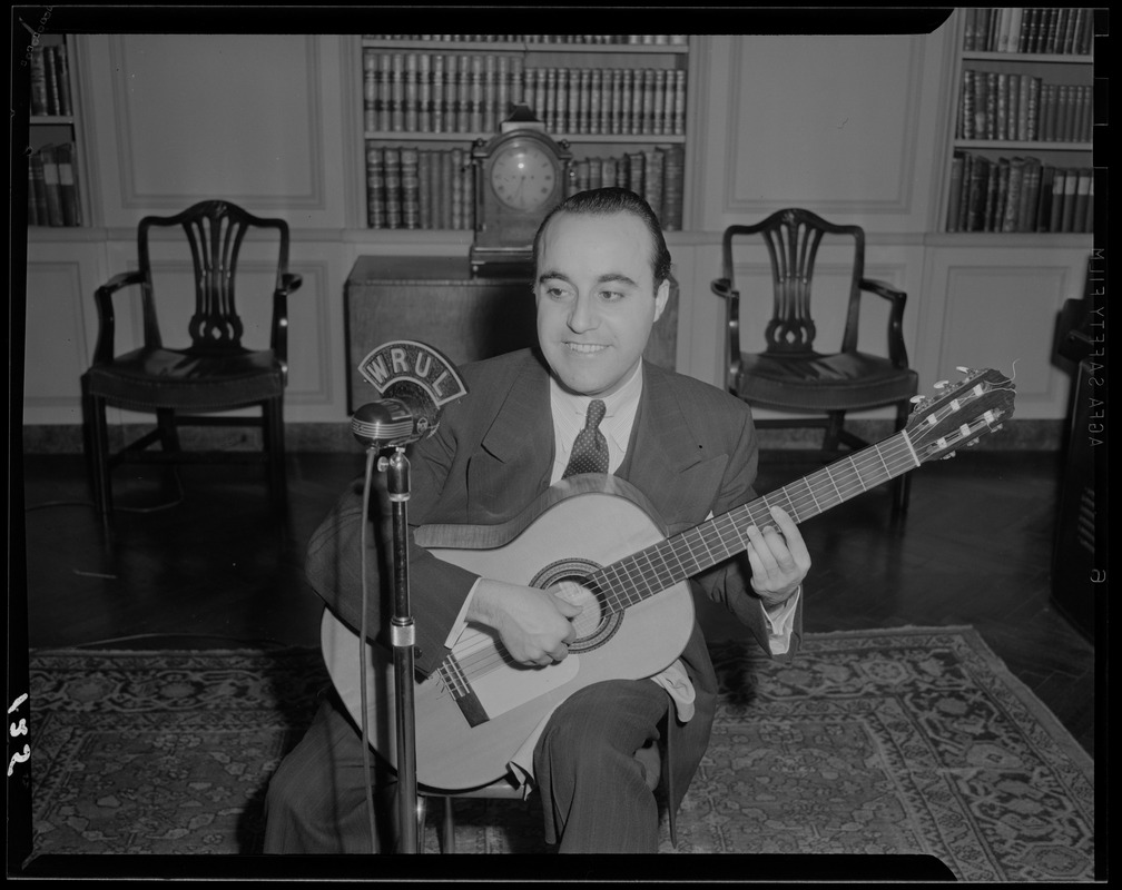 Man playing guitar on WRUL