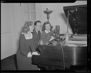 George Crowell, Susanna Foster, and Dolly Loehr (Diana Lynn) at the piano