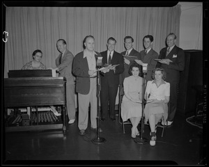 Performers singing with an organ