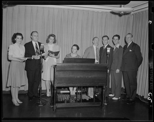 Performers singing with an organ