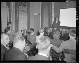 Man from Public Safety Committee presents to an audience