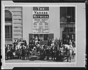 Yankee House Party performers with billboard