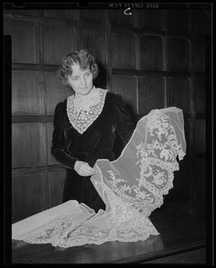 Woman modeling old English lace