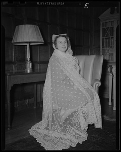 Woman modeling old English lace