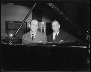J. Green and Mr. Saltman at the piano