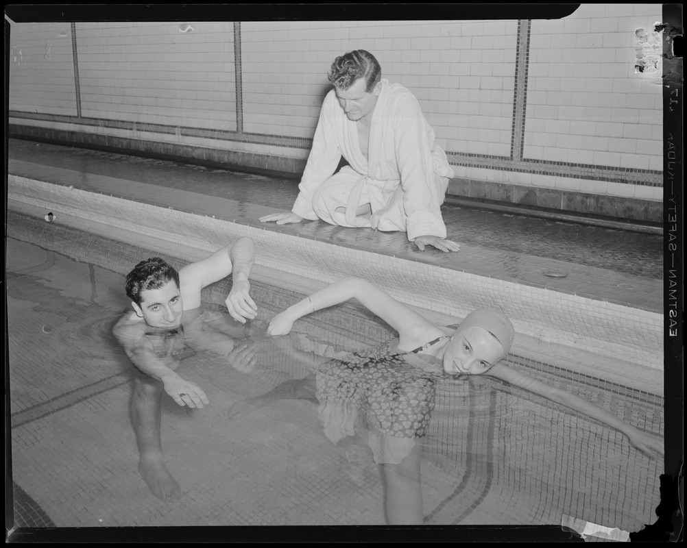 Boy and girl swimming