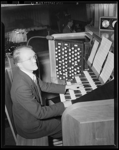 Providence Bible Institute student at organ