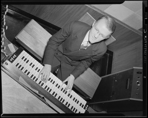 Providence Bible Institute student at organ