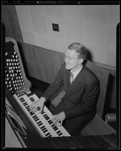 Providence Bible Institute student at organ