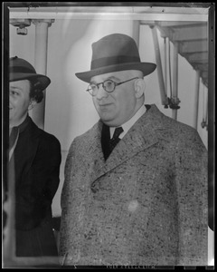 Portrait of man in hat and glasses