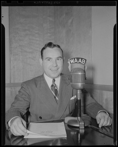 Unidentified man at WAAB microphone