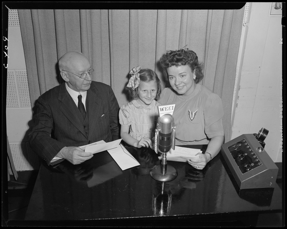 Priscilla Fortescue at WEEI studio with two unidentified guests