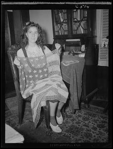 Youth on Parade girl holding up crochet American flag